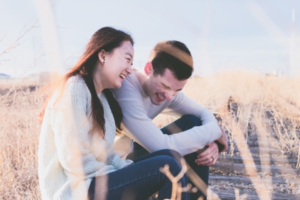 Laughing by the tracks